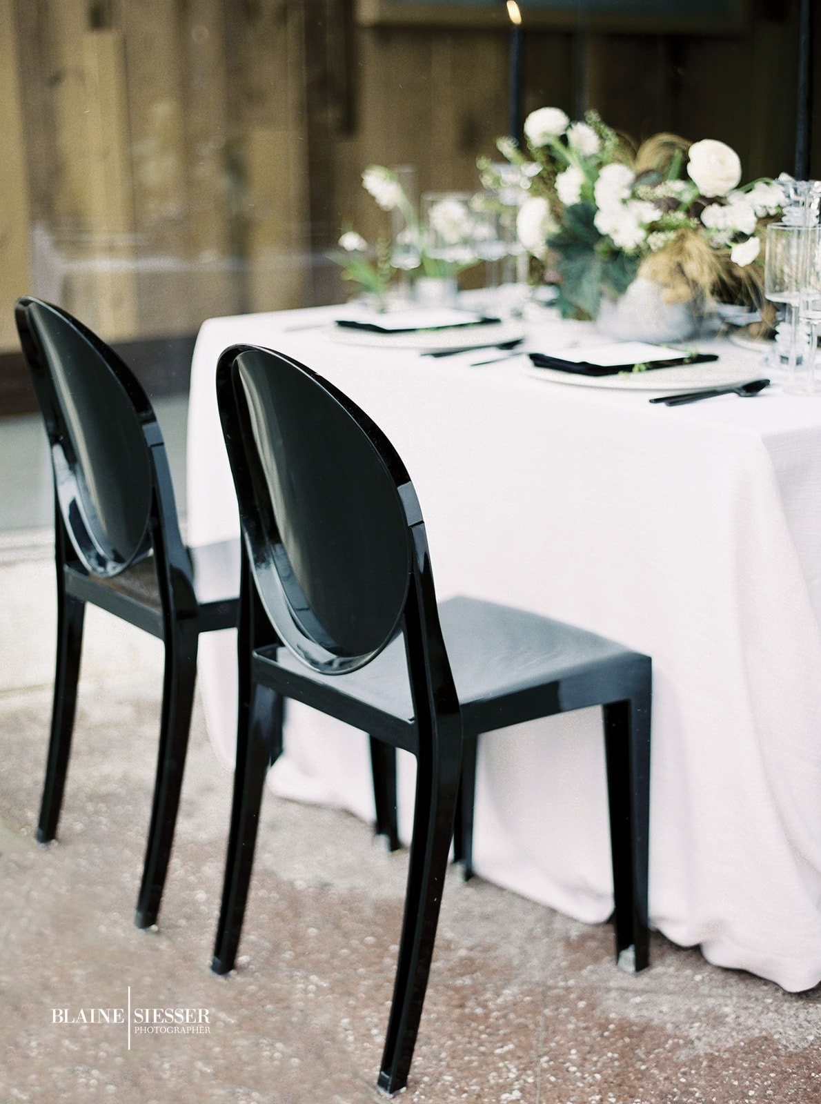 Elegant table setting with specialty chairs