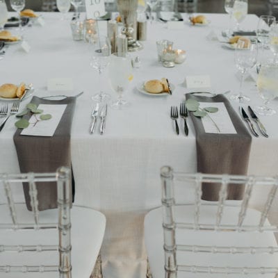 Clear Chiavari Chairs paired with White Panama at the Eastern Market