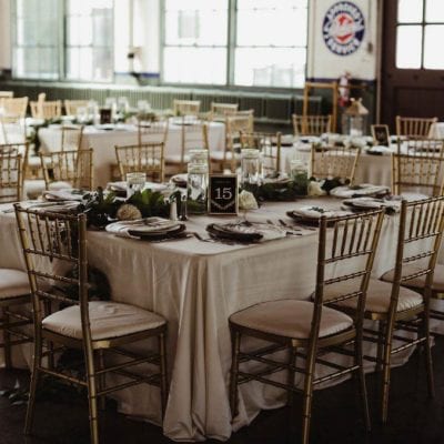 Gold Chiavari Chairs paired with Ivory Manhattan at Packard Proving Grounds