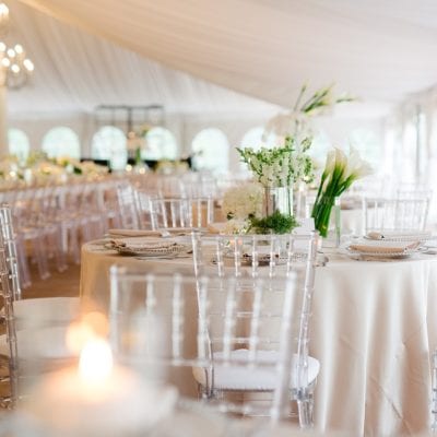 Clear Chiavari Chairs with Champagne Matte Satin at Meadow Brook